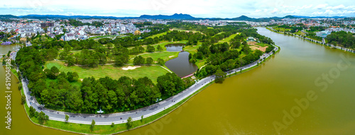 Aerial view of Da Lat city beautiful tourism destination in central highlands Vietnam. Urban development texture, green parks and city lake. photo