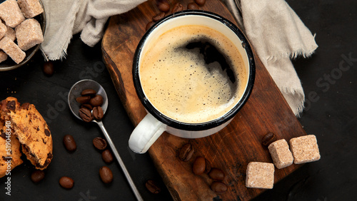 Cup of black coffee on dark background. photo