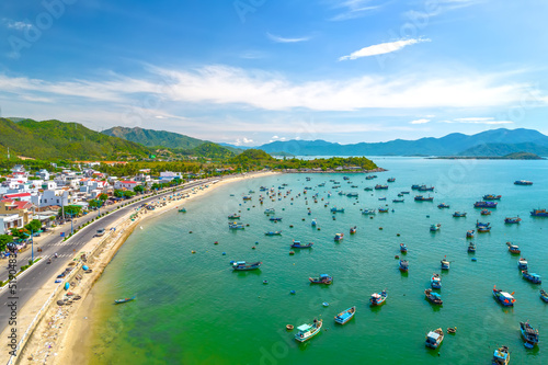 Vinh Luong fishing village, Nha Trang, Vietnam seen from above with hundreds of boats anchored to avoid storms, traffic and densely populated areas below