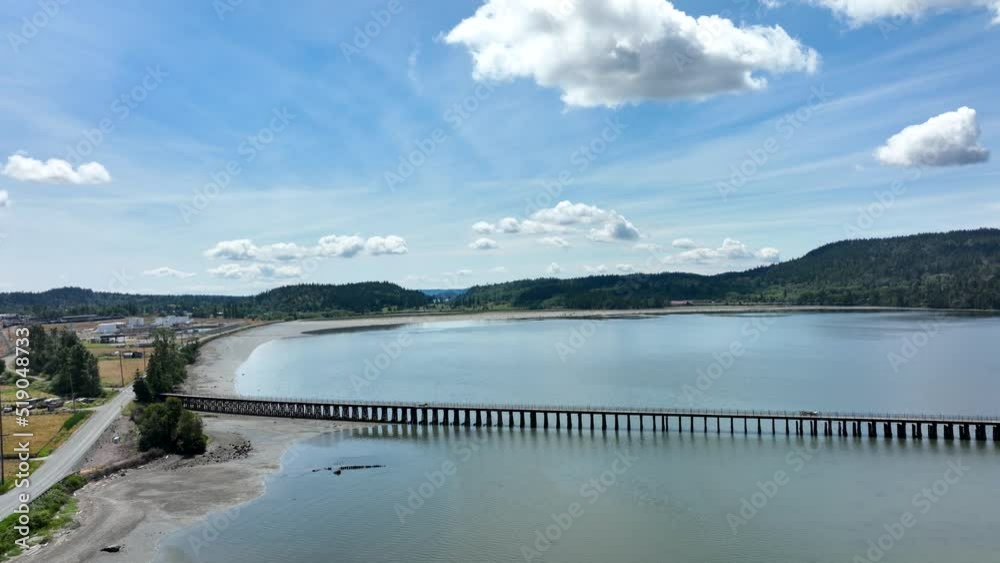 Wide overhead aerial shot of Fidalgo Bay's beautiful shore and foot bridge. Wide overhead aerial shot of Fidalgo Bay's beautiful shore and foot bridge.