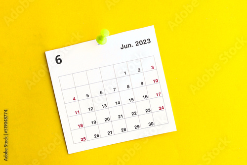 june calendar 2023 on a yellow background.