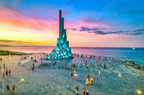 Sunset at Nghinh Phong cape, Phu Yen, Vietnam, with square, beach, park, beautiful sunset sky. Nghinh Phong Is A New Symbol Of Phu Yen photo