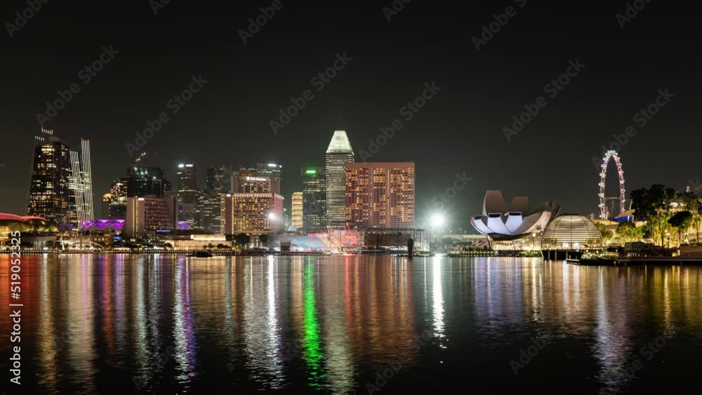 Timelapse of skyscrapers at Marina Bay, Singapore at night Timelapse of skyscrapers at Marina Bay, Singapore at night