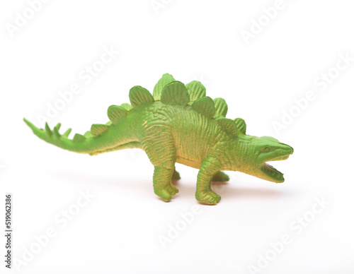 Fototapeta Naklejka Na Ścianę i Meble -  Toy green dinosaur isolated on white background