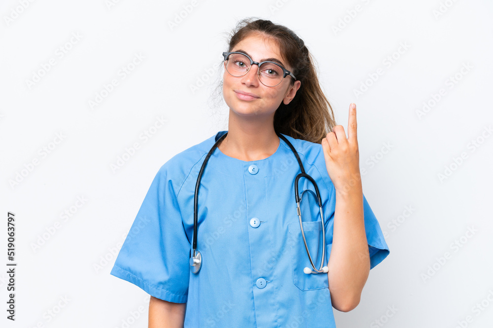 Young nurse doctor woman isolated on white background pointing with the index finger a great idea Young nurse doctor woman isolated on white background pointing with the index finger a great idea