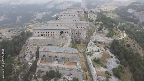 Aerial drone shot of the Victor-Emmanuel Fortress, a spectacular barrier of Esseillon architecture design built on a limestone cliff in Aussois, France photo