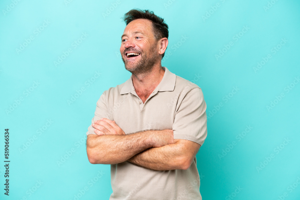Middle age caucasian man isolated on blue background happy and smiling Middle age caucasian man isolated on blue background happy and smiling