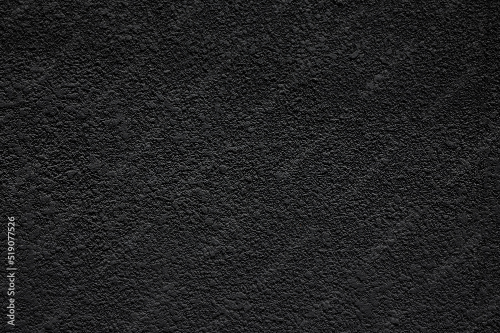 Bumpy black wall texture with fine undulations Bumpy black wall texture with fine undulations