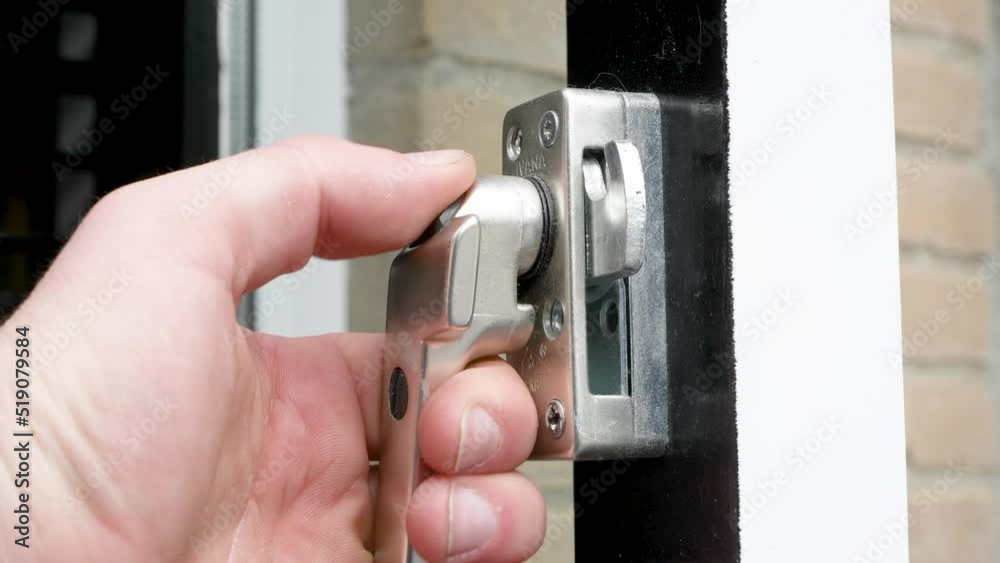 Opening and closing window mechanism with hand. Turn window lock open