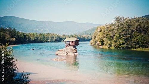 A beautiful view of the Lonely house on the river Drina in Bajina Basta, Serbia. Meditative calm footage.  photo