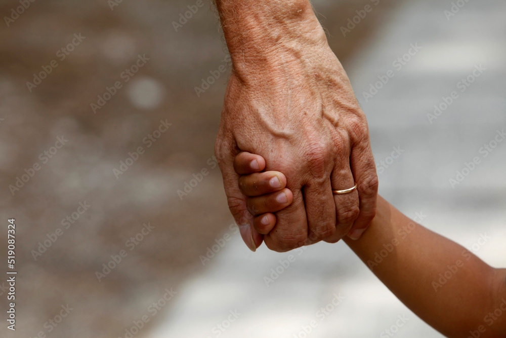 Father and son holding hands Father and son holding hands