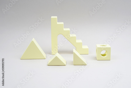 Yellow details of a wooden constructor. Popular color 2021.