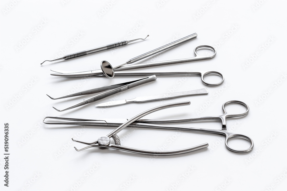 Stack of surgical medical steel equipment at surgery desk Stack of surgical medical steel equipment at surgery desk