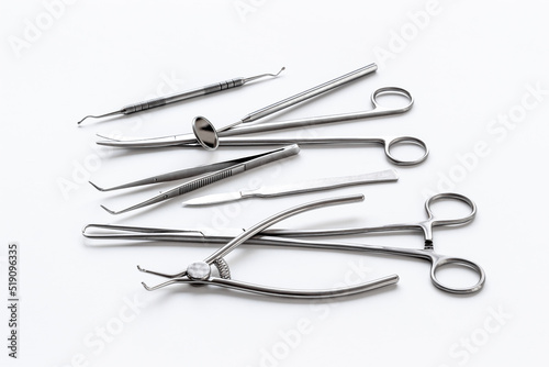 Stack of surgical medical steel equipment at surgery desk