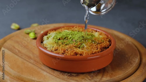 Kanafeh, traditional middle eastern dessert soaked in a sweet syrup.