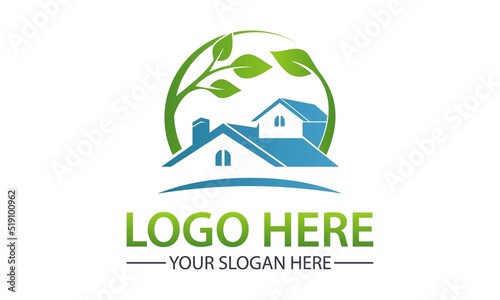 a logo design of real estate building with leaves