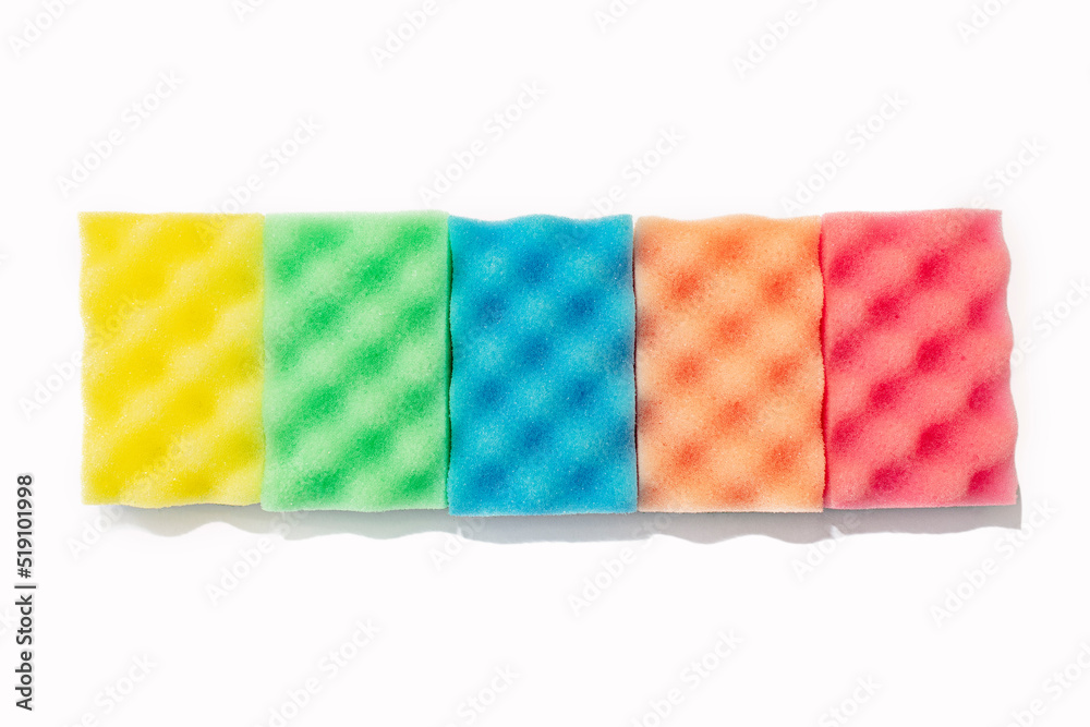 Stack of colorful kitchen cleaning sponges on white background. Stack of colorful kitchen cleaning sponges on white background.