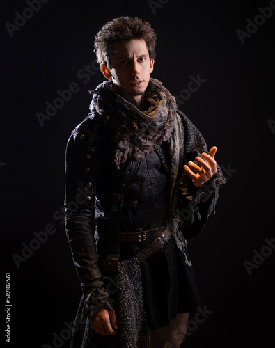 A guy in a steampunk or post-apocalyptic image, portrait on a black background