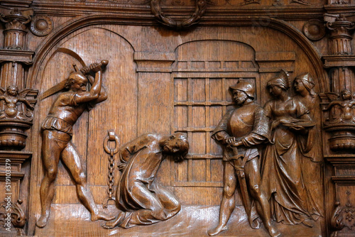 Basilica of St. Denis. Stalls of the Goillon's Chapel (beginning of the 16th century). Depiction of John the baptist beheading.