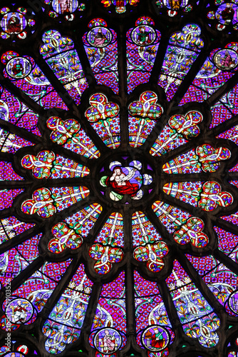 Basilica of St. Denis. North transept. Stained glass Window (a detail). Rose window above the middle gate.