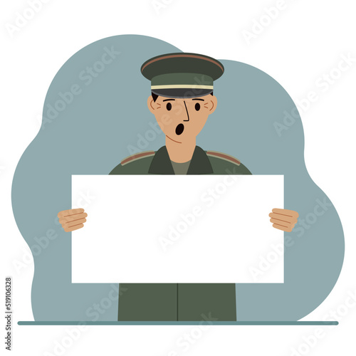 A military man in uniform holds a white sheet of paper in his hands. Concept for advertising, poster, banner.