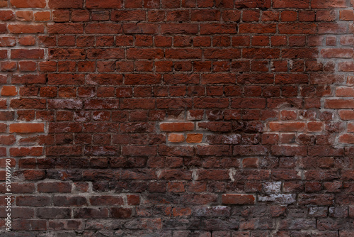Old red brick wall background.