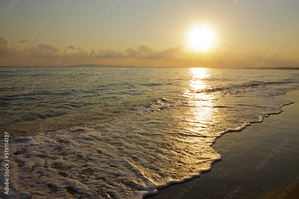Sunrise on the Greek beach. Sea landscape .
