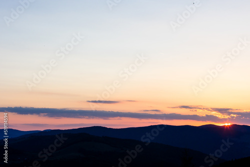 Beautiful sunset landscape with mountains