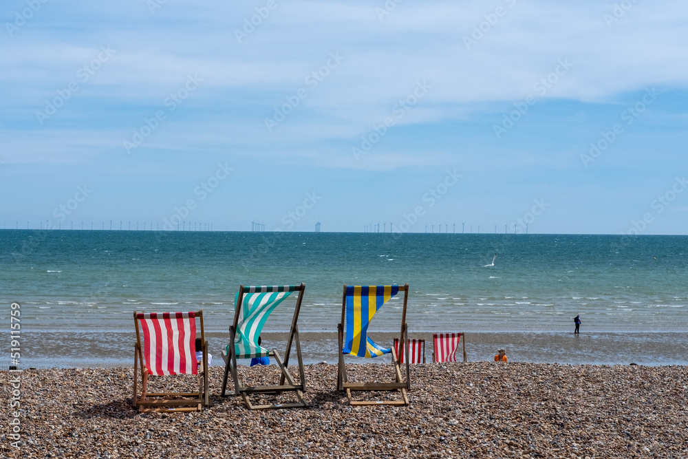 Deckchairs on Worthing beach, West Sussex, England, UK Deckchairs on Worthing beach, West Sussex, England, UK