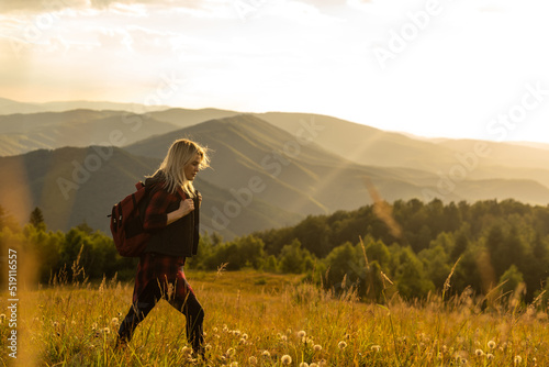 woman backpacker enjoy the view at mountain
