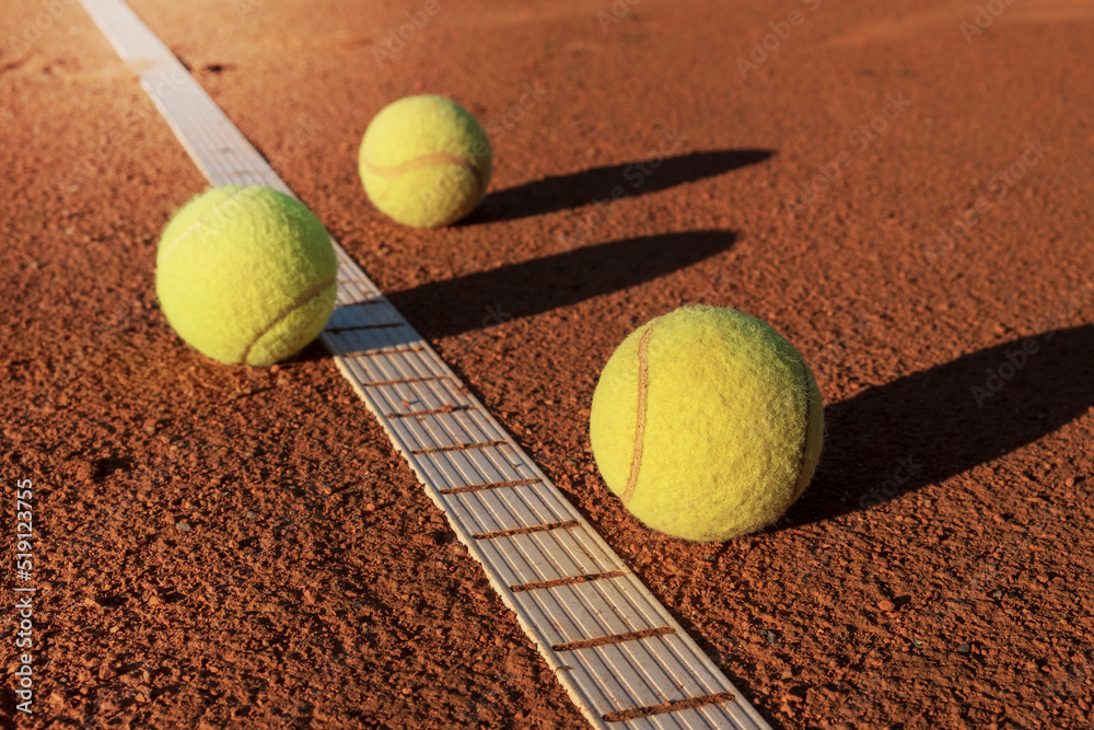 Tennis balls on the court close-up