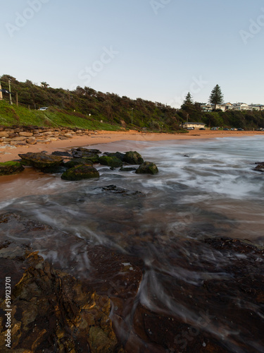 Warriewood Beach coastline view with high tide, Sydney, Australia.