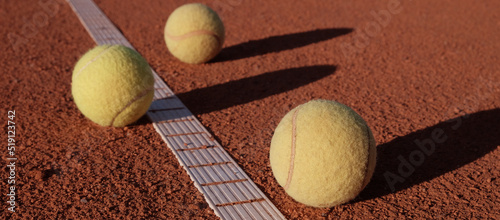Tennis balls on the court close-up