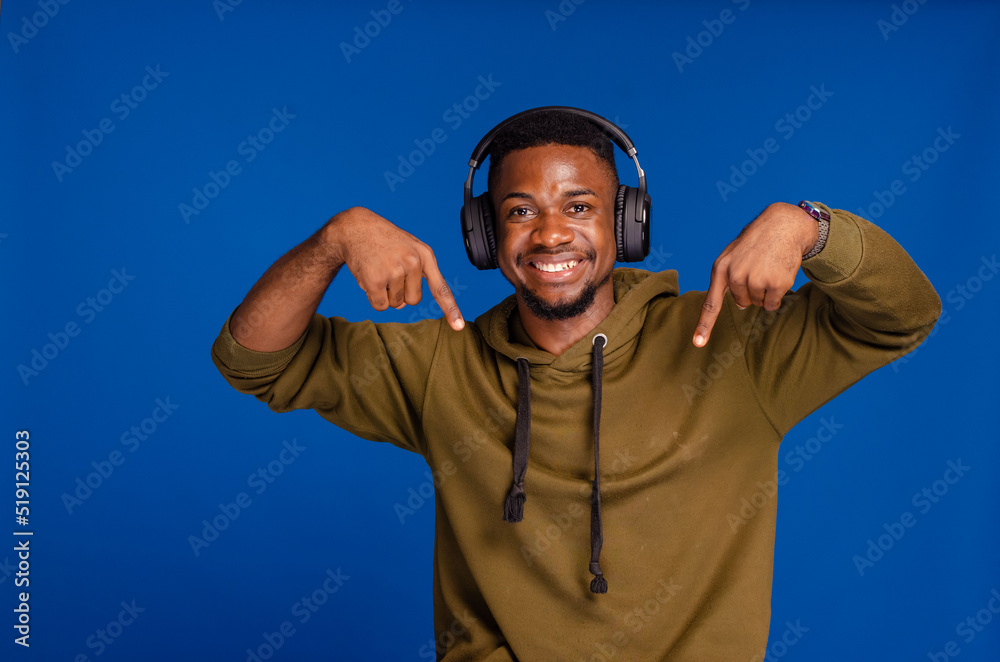 You're next. Funny african man pointing fingers at camera posing in studio You're next. Funny african man pointing fingers at camera posing in studio