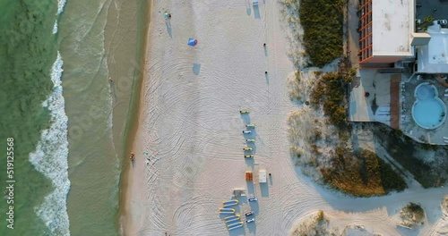 High angle overhead shot of white sand beach near Destin in Florida. Famous relax destination in Gulf of Mexico photo