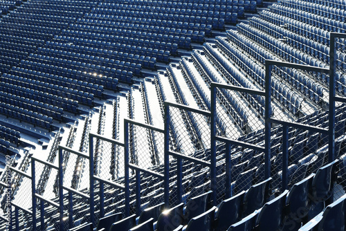 Принти на полотні Blue empty seats on grandstand in the stadium.