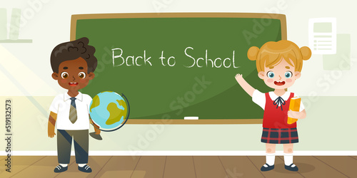 Cute school kids in classroom standing in front of the chalkboard. Cartoon pupils with text back to school on blackboard.