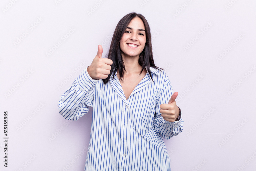 Young caucasian woman isolated on pink background raising both thumbs up, smiling and confident. Young caucasian woman isolated on pink background raising both thumbs up, smiling and confident.