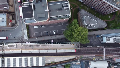 Drone static shot of a top view of the Putney Bridge station platform. photo