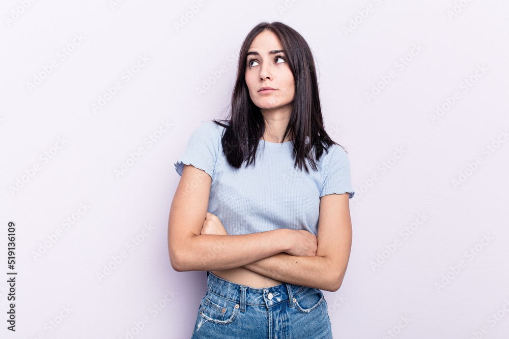 Young caucasian woman isolated on pink background dreaming of achieving goals and purposes Young caucasian woman isolated on pink background dreaming of achieving goals and purposes