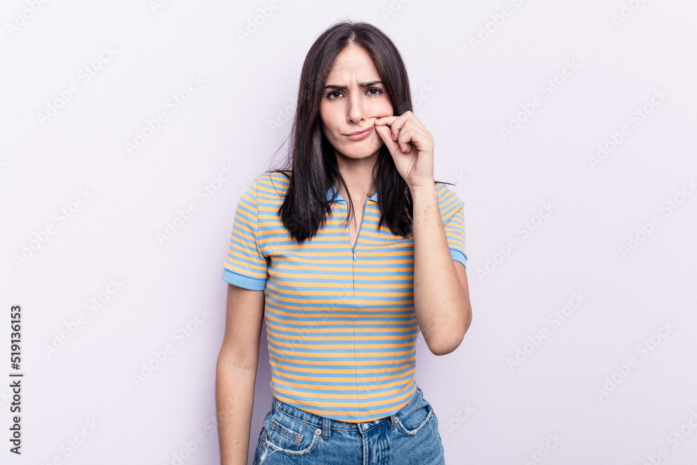 Young caucasian woman isolated on pink background with fingers on lips keeping a secret. Young caucasian woman isolated on pink background with fingers on lips keeping a secret.