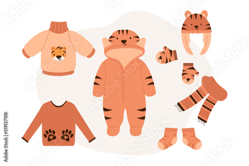 Cute Baby warm autumn and winter Accessories with tiger print. Warm Kids Clothes and Accessories for cold weather. Flat vector illustration.	