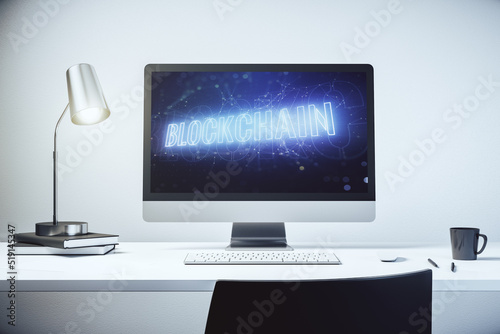 Modern computer monitor with blockchain technology hologram. Research and development decentralization software concept. 3D Rendering