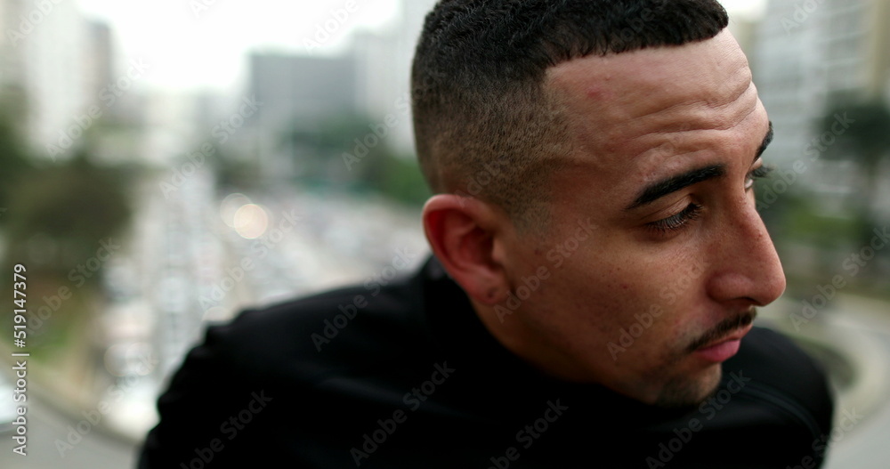 Frustrated lonely young hispanic man in city Frustrated lonely young hispanic man in city