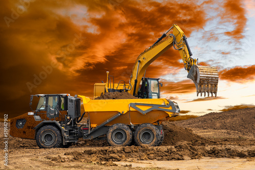 excavator is digging at construction site