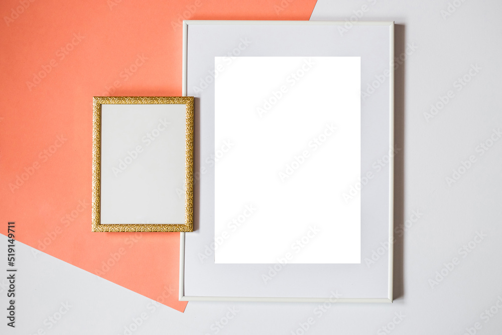 Mock up poster. Minimal template with empty picture frame mock up. Orange and white background Mock up poster. Minimal template with empty picture frame mock up. Orange and white background