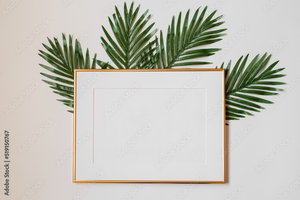 Mock up poster. Minimal template with empty picture frame mock up. White background with plants