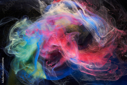 Liquid fluid art abstract background. Mix of dancing acrylic paints underwater