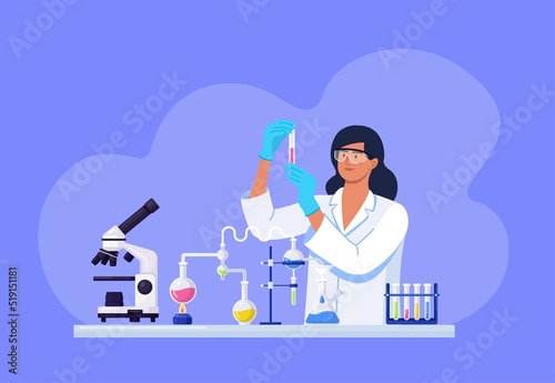 Young beautiful woman chemist with flasks with liquid in hand. Scientist girl is experimenting with equipment for vaccine discovery. Girl working on antiviral treatment development