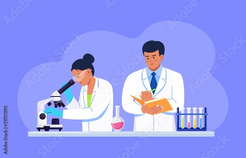 Young woman scientist looking through a microscope in a laboratory doing chemical research, microbiological analysis or medical test. Man with a folder writes down the results